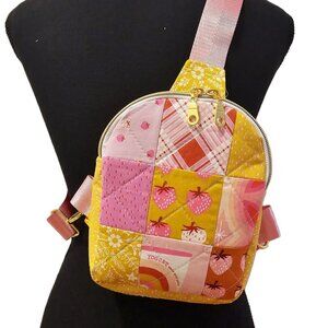 Mav Sling Patchwork Mini Sling Backpack: Ruby Star Society Crossbody Bag